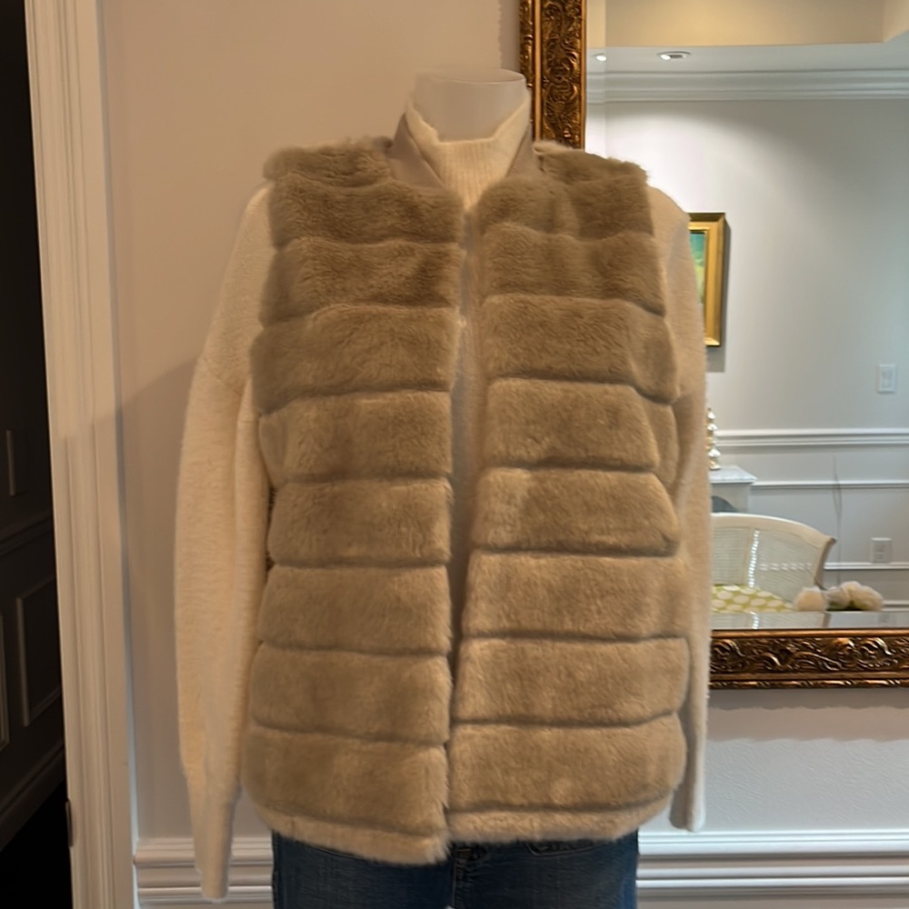 And new day light tan faux fur vest